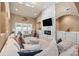 Inviting living room with marble fireplace, TV, neutral decor, and ample natural light at 1974 Glen Manor Ct, Lincolnton, NC 28092