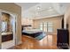 Serene main bedroom with tray ceilings, hardwood floors, and en-suite bathroom at 1974 Glen Manor Ct, Lincolnton, NC 28092