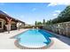 Sparkling swimming pool with brick trim, inviting you to take a refreshing dip on a sunny day at 1974 Glen Manor Ct, Lincolnton, NC 28092