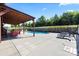 Spacious pool deck with ample seating for lounging and entertaining, plus convenient covered patio at 1974 Glen Manor Ct, Lincolnton, NC 28092