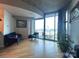 Bright open concept living room with balcony and stunning city view at 210 N Church St, Charlotte, NC 28202