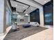 Modern lobby with sleek decor and a calming water feature at 210 N Church St, Charlotte, NC 28202