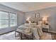 Cozy bedroom with neutral tones, a comfortable bed, and a patterned rug adding warmth to the space at 2126 Robby Dr, Maiden, NC 28650