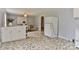 Bright kitchen featuring a retro refrigerator, ample cabinetry, and an adjacent dining area at 2126 Robby Dr, Maiden, NC 28650