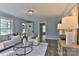 Cozy living room with comfortable seating, modern furnishings, wood-look floors, and plenty of natural light at 2126 Robby Dr, Maiden, NC 28650