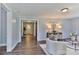 Inviting living room featuring an open doorway, modern decor, and elegant furnishings on stylish wood-look floors at 2126 Robby Dr, Maiden, NC 28650