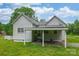 Rear view of home featuring covered parking and convenient access to the backyard at 2126 Robby Dr, Maiden, NC 28650