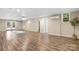 Spacious finished basement featuring hardwood floors, recessed lighting, and natural light at 220 Pinehurst Ln, Newton, NC 28658