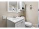 Well-lit bathroom with modern vanity, faucet, and fixtures at 220 Pinehurst Ln, Newton, NC 28658