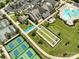 This is an aerial view of the community pool, tennis courts, parking, and clubhouse at 2329 Delaney Dr, Fort Mill, SC 29715