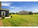 Expansive backyard featuring green grass and a view of neighboring properties at 2329 Delaney Dr, Fort Mill, SC 29715