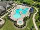 A resort-style community pool with seating and manicured landscaping at 2329 Delaney Dr, Fort Mill, SC 29715