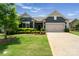 Charming single-Gathering home with well-manicured lawn and an attached two-car garage at 2329 Delaney Dr, Fort Mill, SC 29715