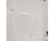 Bright white tiled bathtub and shower at 2445 Selwyn Ave # 104, Charlotte, NC 28209