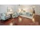 Bedroom featuring hardwood floors, a sitting area and neutral decor at 2445 Selwyn Ave # 104, Charlotte, NC 28209