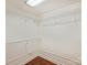 Walk-in closet features wire shelving and hardwood floors at 2445 Selwyn Ave # 104, Charlotte, NC 28209