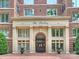 A close-up shot showcases the elegant doorway of 'The Sterling' with its striking architectural details at 2445 Selwyn Ave # 104, Charlotte, NC 28209