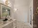 Beautifully decorated hallway features marble floors, stylish lighting, and elegant decor, creating a sophisticated ambiance at 2445 Selwyn Ave # 104, Charlotte, NC 28209