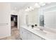 Spacious bathroom featuring double sinks, walk-in closet, shower, and a bright, clean aesthetic at 2928 Parkwest Dr, Albemarle, NC 28001