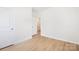 This bedroom is bright and open, with a neutral palette and wood-look flooring, complemented by soft window lighting at 2928 Parkwest Dr, Albemarle, NC 28001