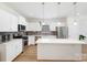 Modern kitchen featuring white cabinets, stainless steel appliances, and a center island at 2928 Parkwest Dr, Albemarle, NC 28001