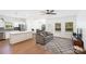 Bright open concept living room with dining area and hardwood floors at 2928 Parkwest Dr, Albemarle, NC 28001
