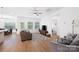 Open concept living room with natural light and comfortable seating arrangements at 2928 Parkwest Dr, Albemarle, NC 28001