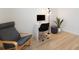 Bright and modern office space featuring a comfortable chair and desk setup at 2928 Parkwest Dr, Albemarle, NC 28001