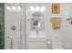 This sleek bathroom features a walk-in shower and updated fixtures at 3549 Woodleaf Rd, Charlotte, NC 28205