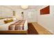 Comfortable bedroom with a large bed, warm lighting, and contemporary decor at 3549 Woodleaf Rd, Charlotte, NC 28205
