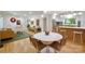 Open dining area with modern decor, stylish seating, and seamless flow to the living room and kitchen at 3549 Woodleaf Rd, Charlotte, NC 28205