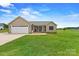 Attractive single-story home with a well-kept lawn, two-car garage, and inviting front porch area at 3645 Kimber Ln, Sherrills Ford, NC 28673