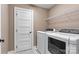 Functional laundry area with modern washer and dryer set, plus wire shelving for storage at 3645 Kimber Ln, Sherrills Ford, NC 28673