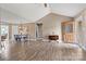 Open-concept living room with high ceilings, a dining area, and a view of the front entrance at 3645 Kimber Ln, Sherrills Ford, NC 28673
