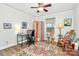 Inviting bedroom with a decorative rug, desk, and stylish screen divider providing functional and decorative appeal at 3708 Sweetgrass Ln, Charlotte, NC 28226