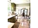 Charming kitchen and dining nook with wood floors, stainless appliances, and an open layout at 3708 Sweetgrass Ln, Charlotte, NC 28226