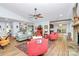 Inviting living room with vaulted ceiling, fireplace, and bright furniture for a comfortable space at 3708 Sweetgrass Ln, Charlotte, NC 28226