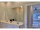 Bright bathroom features double sinks, a large mirror, and a separate shower at 3712 Travertine Dr, Lancaster, SC 29720
