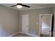 Bedroom doorway showing carpet floors, ceiling fan, and neutral paint color at 3712 Travertine Dr, Lancaster, SC 29720