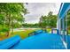 Inviting deck for outdoor entertaining, showcasing lake views, and a custom blue paint scheme at 3911 Sandy Point Dr, York, SC 29745