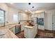 Well-equipped kitchen with custom cabinets, stainless steel appliances, and a butcher block island at 3911 Sandy Point Dr, York, SC 29745