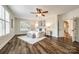 Serene main bedroom with natural light, ceiling fan, and a soothing color scheme at 3911 Sandy Point Dr, York, SC 29745