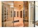 Relaxing in-home wooden sauna perfect for unwinding after a long day, featuring a glass door at 3911 Sandy Point Dr, York, SC 29745