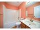 Bathroom features a white shower, toilet, and vanity with a wood finish offering a clean and functional space at 4037 Lakota Ct, Charlotte, NC 28269