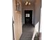Inviting entryway with wood-look flooring and modern light fixture at 4041 Port Richmond Ave # 9, Gastonia, NC 28056
