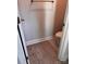 Small toilet room showcasing tile flooring and compact space utilization at 4041 Port Richmond Ave # 9, Gastonia, NC 28056