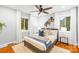 Bedroom featuring hardwood floors, neutral colors, natural light and ceiling fan at 4114 Stacy Blvd, Charlotte, NC 28209