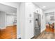 Contemporary kitchen with white cabinetry, stainless steel appliances, and hardwood flooring at 4114 Stacy Blvd, Charlotte, NC 28209