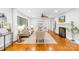 Inviting living room with hardwood floors, a cozy fireplace, and stylish furnishings at 4114 Stacy Blvd, Charlotte, NC 28209