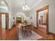 Spacious dining room with hardwood floors, views into the hallway and living room, offers a welcoming atmosphere at 4569 Edgeland Rd, Edgemoor, SC 29712